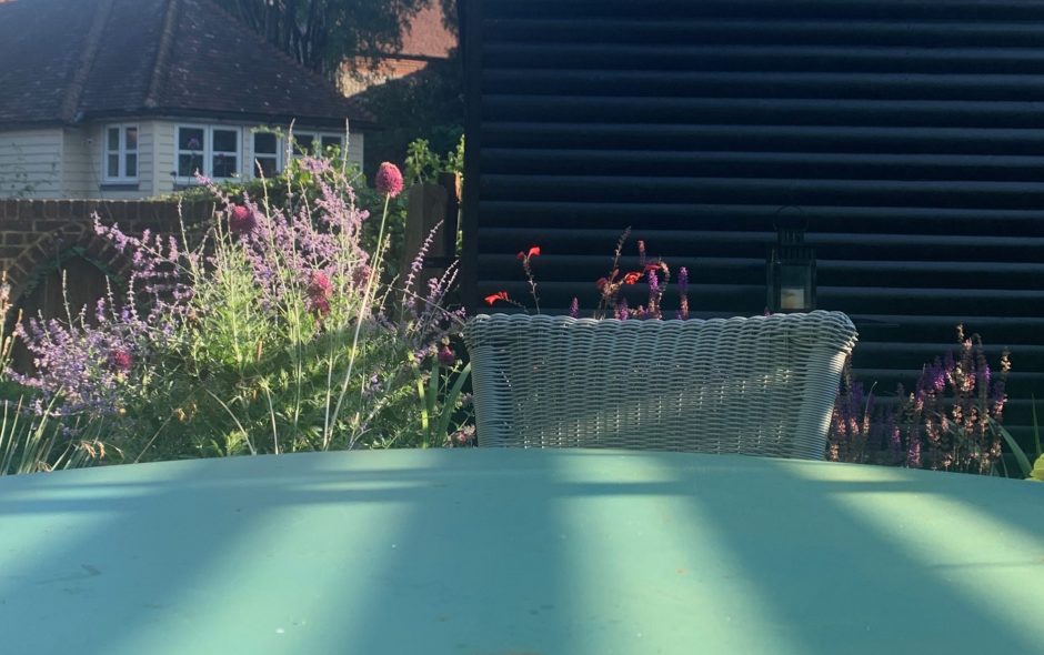 At the green table